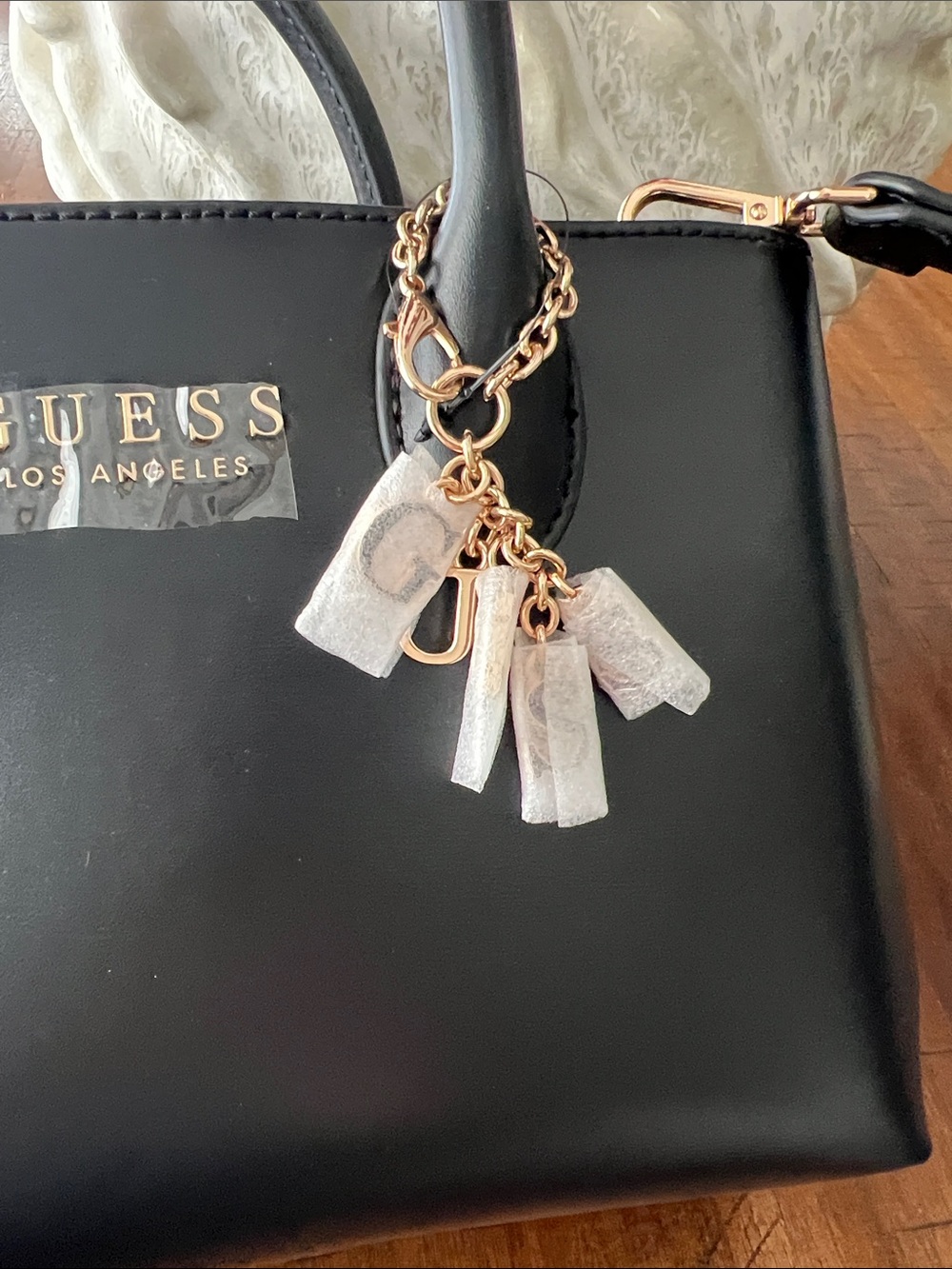 Guess Black Satchel with Gold Logo and Tassel Charm - Picture 7 of 7